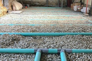 Dallage intégrant une membrane et une isolation thermique